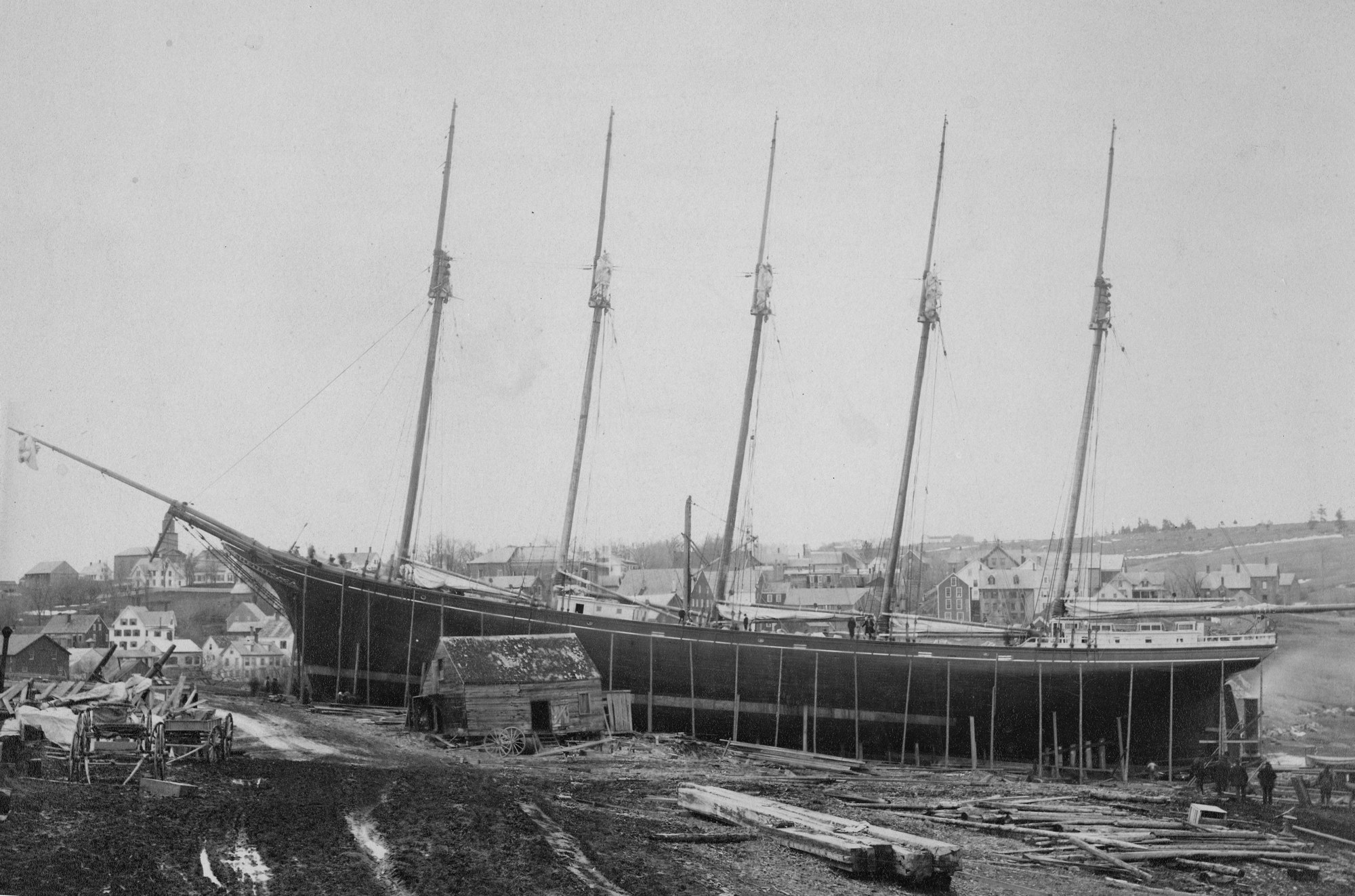 Old photograph of the five-masted schooner Governor Ames on the stocks before her launch at a Maine shipyard in 1888