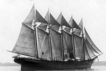 Black-and-white photograph of the five-masted schooner Governor Ames under full sail