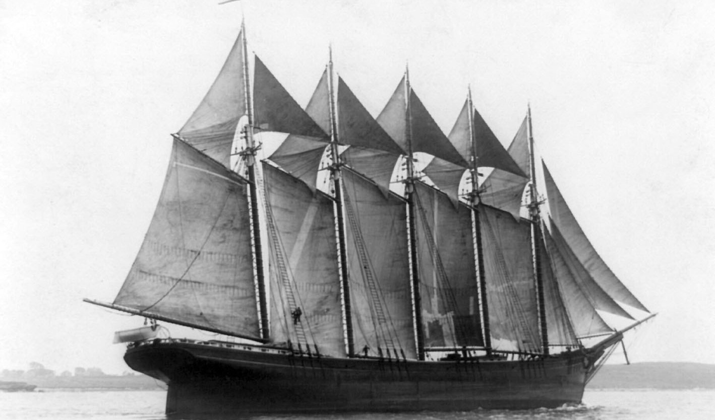 Black-and-white photograph of the five-masted schooner Governor Ames under full sail