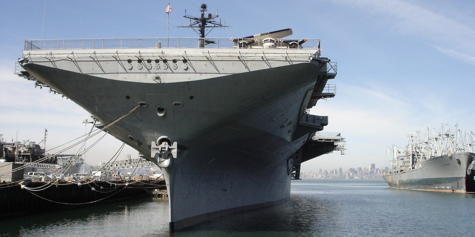 The bow of the aircraft carrier USS Hornet (CV-12) moored at Alameda, California