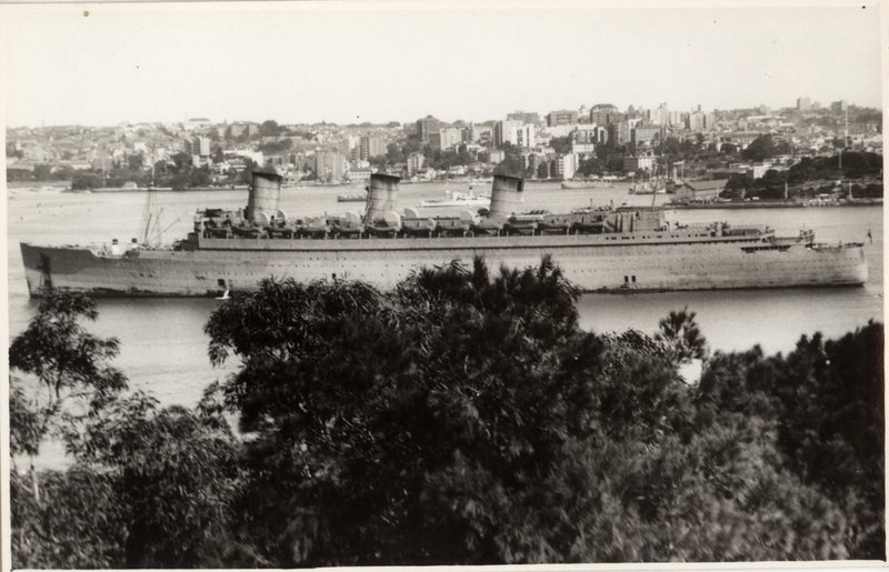 The Queen Mary painted wartime grey as a troopship in Sydney Harbour