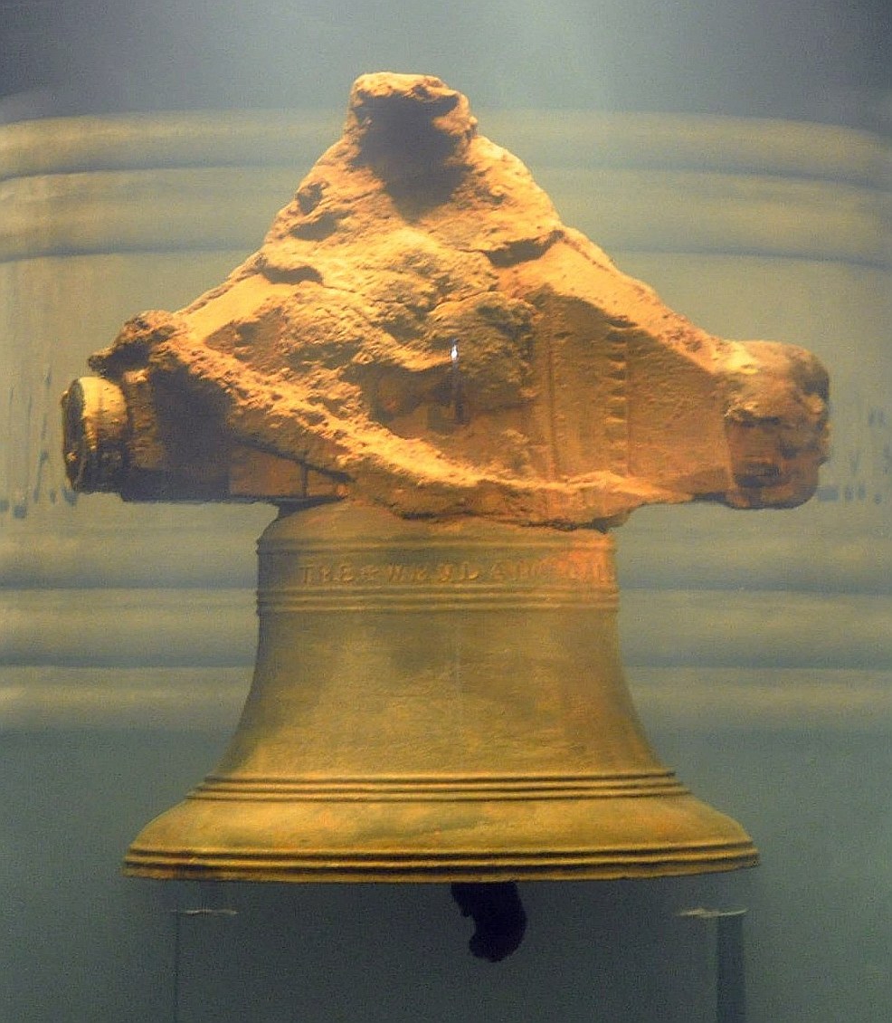 The bronze ship's bell of the Whydah, encrusted with sea concretion, on display